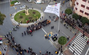 Izada de la bandera de los VI Juegos de Policías y Bomberos.