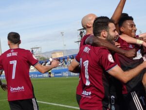 Jugadores del Recreativo celebrando el gol. (Tenor)