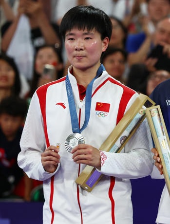 bing-jiao-recuerda-podio-carolina-marin