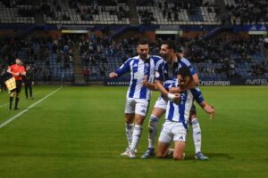 Jugadores del Recre ceebrando el gol. (Tenor)